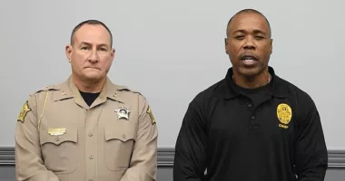 In a Facebook video Bowling Green, Kentucky Police Chief Michael Delaney, right, said at least three groups were planning to protest at noon on Saturday. Sheriff Brett Hightower is seen left