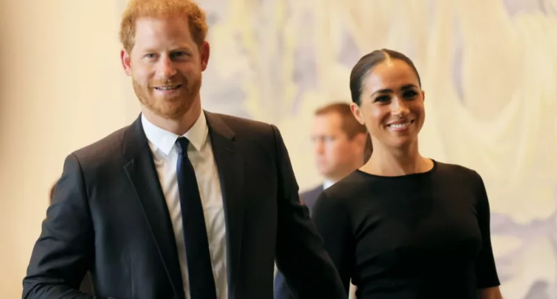 Prince Harry and Meghan Markle walk hand-in-hand at the United Nations.