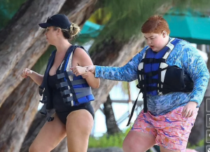 Brendan Fraser eldest son Griffin, 20, who is autistic and obese, pictured with his mother Afton Smith in 2017