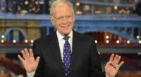 David Letterman holding up his hands on The Late Show with David Letterman