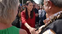 Former New Zealand prime minister Jacinda Ardern (pictured) has been met with a cheering crowd as she left parliament for the final time