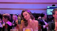 Miranda Kerr brings her own dinner to star-studded G'Day USA Gala and eats a banana at the table