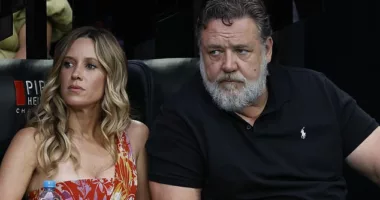 Russell Crowe took a well-deserved break as he relaxed with his girlfriend Britney Theriot at the Australian Open in Melbourne on Saturday. Both pictured