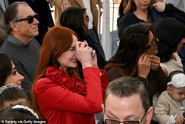 Sophie Turner snaps photos as The Jonas Brothers receive star on The Hollywood Walk of Fame