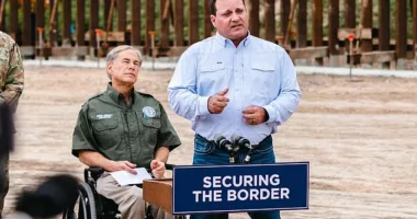 Michael Banks (right) discusses his new role as Texas' border czar alongside the state's Governor Greg Abbott (right) on Monday January 30, 2023