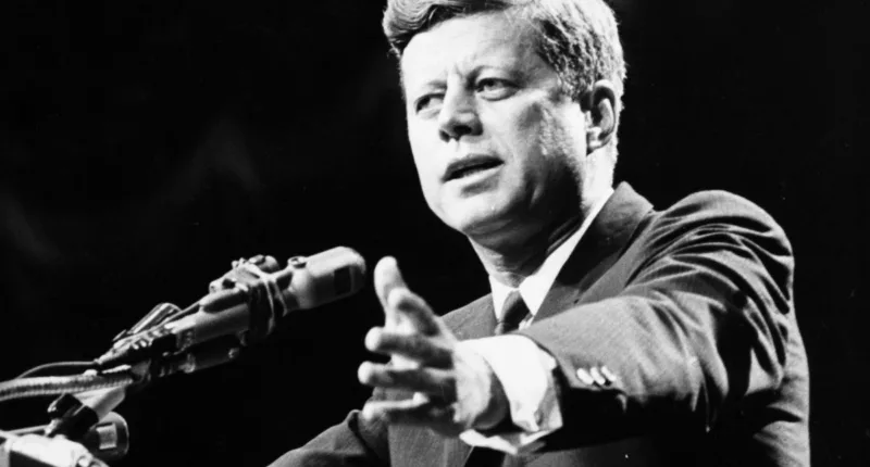 President John F. Kennedy at a podium