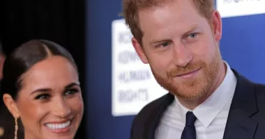 Questions about whether Prince Harry (pictured with wife Meghan) should be allowed to retain his official titles have raged ever since he stood back from Royal duties