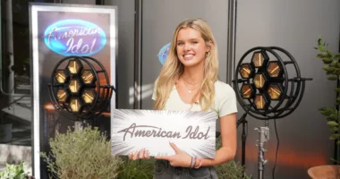 Kenedi Anderson holds her platinum ticket on American Idol Season 20