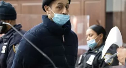 Luis Peroza, 39, covered his face with a mask and looked glum as he stood in front of a judge at Manhattan Criminal Court on February 5