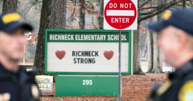 Ex-principal at Va. school where boy shot teacher was not told the child had a gun, her lawyer says