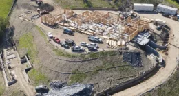 Making progress: Kylie Jenner's massive $15-million compound was pictured on Wednesday in exclusive aerial photos obtained by DailyMail.com. Worker crews were seen sprawled out as construction proceeded on the 5-acre property
