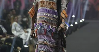 Naomi Campbell takes the Awa Meité runway by storm in a sustainable handwoven maxi dress