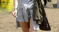 It girl: Alexa Chung wears silver space-age short jumpsuit at Glastonbury on Sunday