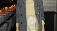 Fashion icon: Alexa Chung looked chic in her lemon ensemble at the Christian Siriano fashion show in NYC on Saturday