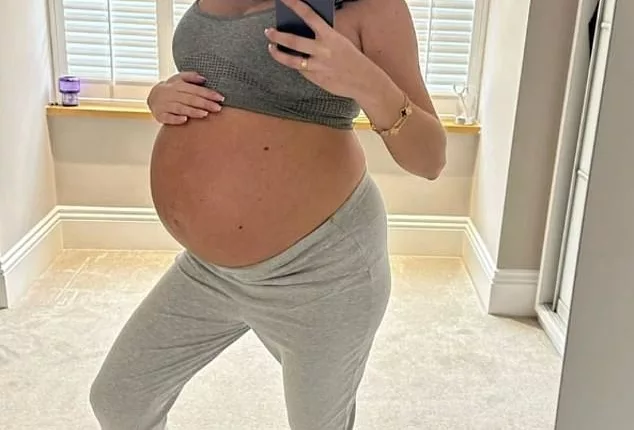 Amy Childs shows off baby bump in a sports bra