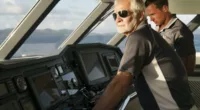 Captain Lee Rosbach and bosun Kelley Johnson in the bridge on