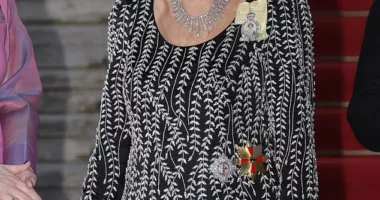 The Queen Consort oozed sophistication in a black evening dress with a sparkling silver embroidery in Berlin