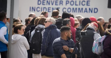 Fox News reporter hugs son on camera as he leaves site of Denver school shooting