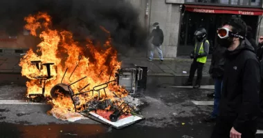 France strikes and protests over pension changes heat up as Macron defends his controversial reforms