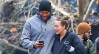 GMA's Michael Strahan and rarely seen girlfriend look loved up and happy as they return home from the gym together