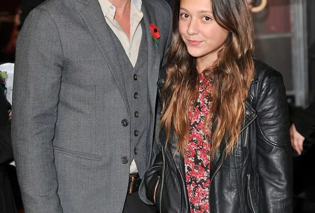 Dad's date: Gary Lineker and stepdaughter Ella at The Hunger Games: Catching Fire' film premiere London