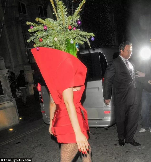 Wearing real fir: Lady Gaga returns to her hotel after the Jingle Bell Ball at London's O2 bizarrely dressed as a Christmas Tree