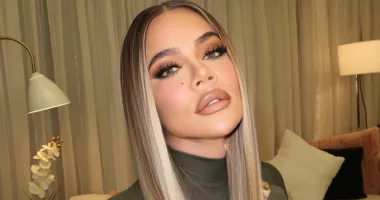Kardashian fans 'obsessed' with Khloe's new hair and praise the star's look as she poses in tight dress with glam squad
