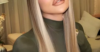 Glammed: Khloe Kardashian was glowing as she showed off her makeup while modeling her older sister, Kim Kardashian's fashion line Friday