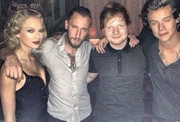 Cosy: Taylor Swift, Ed Sheeran and Harry Styles pose for a photo with a male friend at Robin Thicke's MTV VMAs after-party