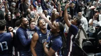 Fairleigh Dickinson players went wild after earning the historic upset over Purdue