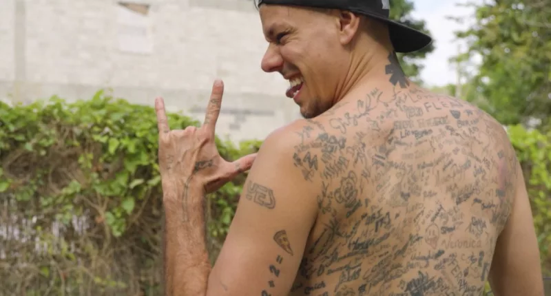 Meet Funky Matas, the world record holder for most signatures tattooed on his back