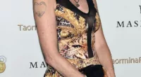 Making a statement: Melanie Griffith appeared to have covered up Antonio Banderas' first name on her heart tattoo as she hit the red carpet of the Taormina Film Festival in Italy on Tuesday