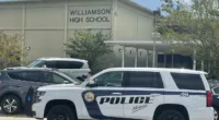 Mother allegedly used gun to threaten group of high school kids who beat up her child in south Alabama