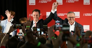 Chris Minns stood hand in hand with Anthony Albanese as they hailed in a new era
