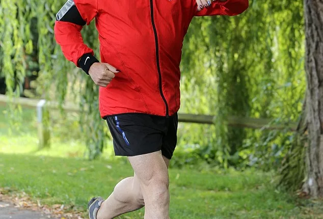 Fitting it in: Eddie Izzard was seen going for a job ahead of V Festival in Essex on Saturday
