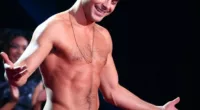 Zac l'orange: Efron's pale face did not match his tangerine torso at the MTV Movie Awards on Sunday