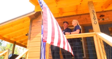 American flag saved from 2022 Sevier Co. wildfire flying at veteran's home again