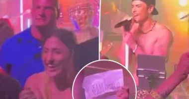 Fan kicked out of Tom Sandoval's concert for holding 'Team Ariana' sign, giving him the finger