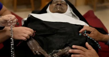 Hundreds flock to see exhumed nun's little-decayed body