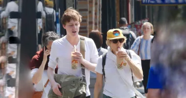 Jodie Foster, 60, strolls with rarely-seen son Kit, 21, and wife Alexandra in new photos from NYC outing