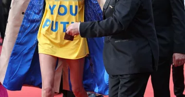 Ukrainian model Alina Baikova wore a short dress emblazoned with the message 'F*** YOU PUTIN' on the Cannes red carpet