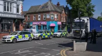 A boy and woman have been taken to hospital with serious injuries after being hit by a car near an Asda supermarket in Birmingham during the morning school run today