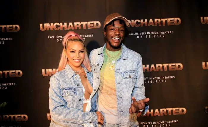 DC Young Fly and Ms Jacky Oh attend screening for Uncharted at iPic Theater in Colony Square