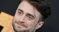 Daniel Radcliffe posing while at the premiere of 'The Lost City'.