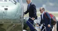 President Joe Biden boards Marine One with his son Hunter Biden as he leaves Andrews Air Force Base on his way to Camp David on Saturday