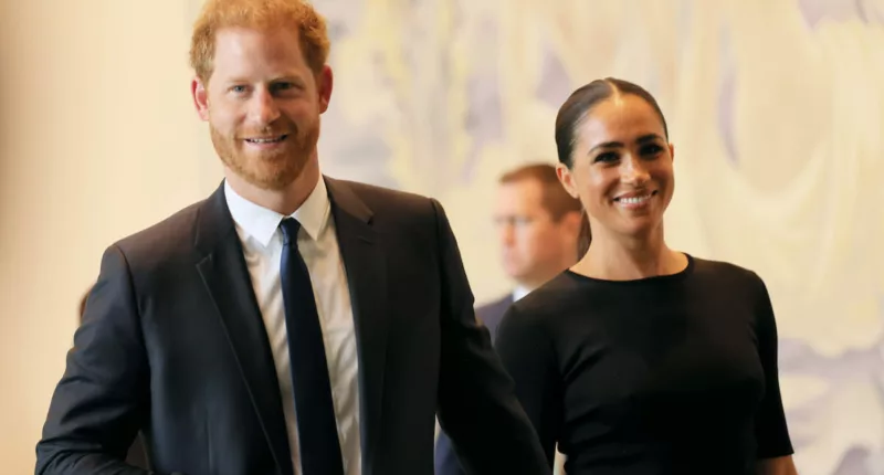 Prince Harry and Meghan Markle's, whose Spotify deal end signals a need for 'criticial' friends, according to a commentator, look on
