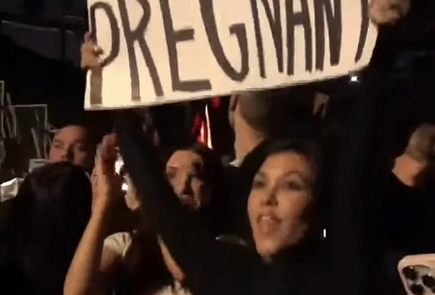 Congrats! Kourtney Kardashian, 44, is expecting her first child with husband Travis Barker , 46, and announced the news to the world on Instagram, by sharing a video of her surprise reveal