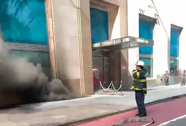 Plumes of smoke pouring out of the Tiffany & Co. Landmark store on Fifth Avenue on Thursday