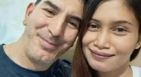 John Totsis (above with his wife Li E Zl) is in hospital with brain injuries after an alleged road rage attack by a 34-year-old man who was refused bail in Bankstown court on Tuesday
