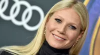 Gwyneth Paltrow smiling at the 'Avengers Endgame' premiere in an all-black wardrobe.